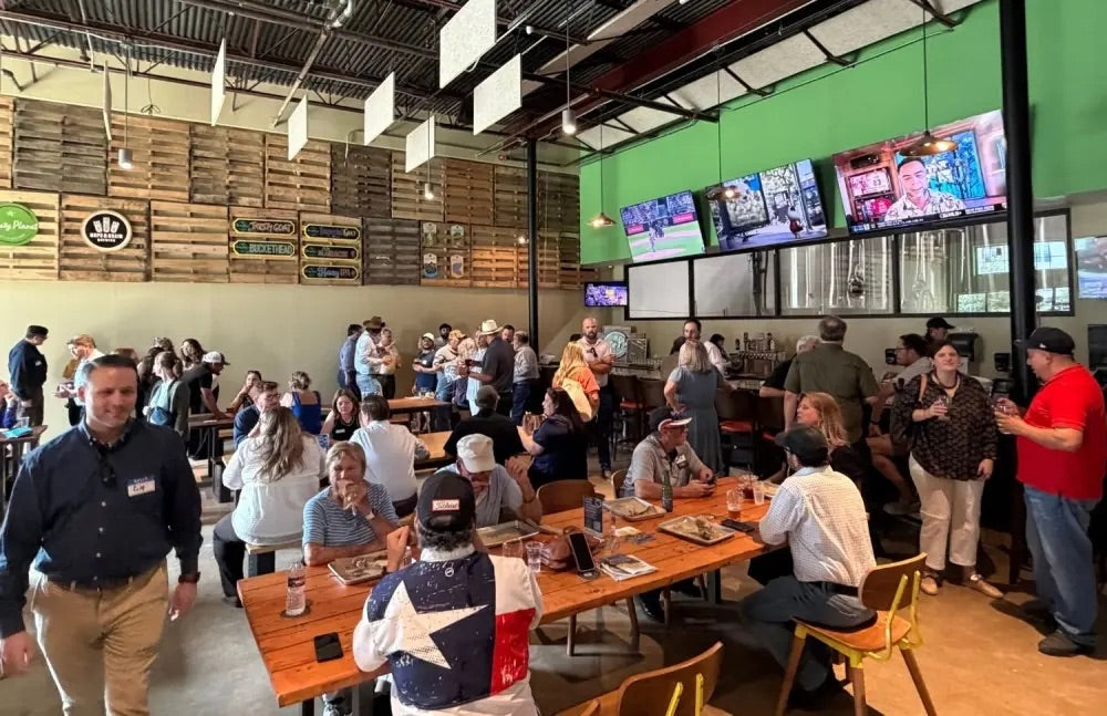 Guests filling the Thirsty Planet tasting room